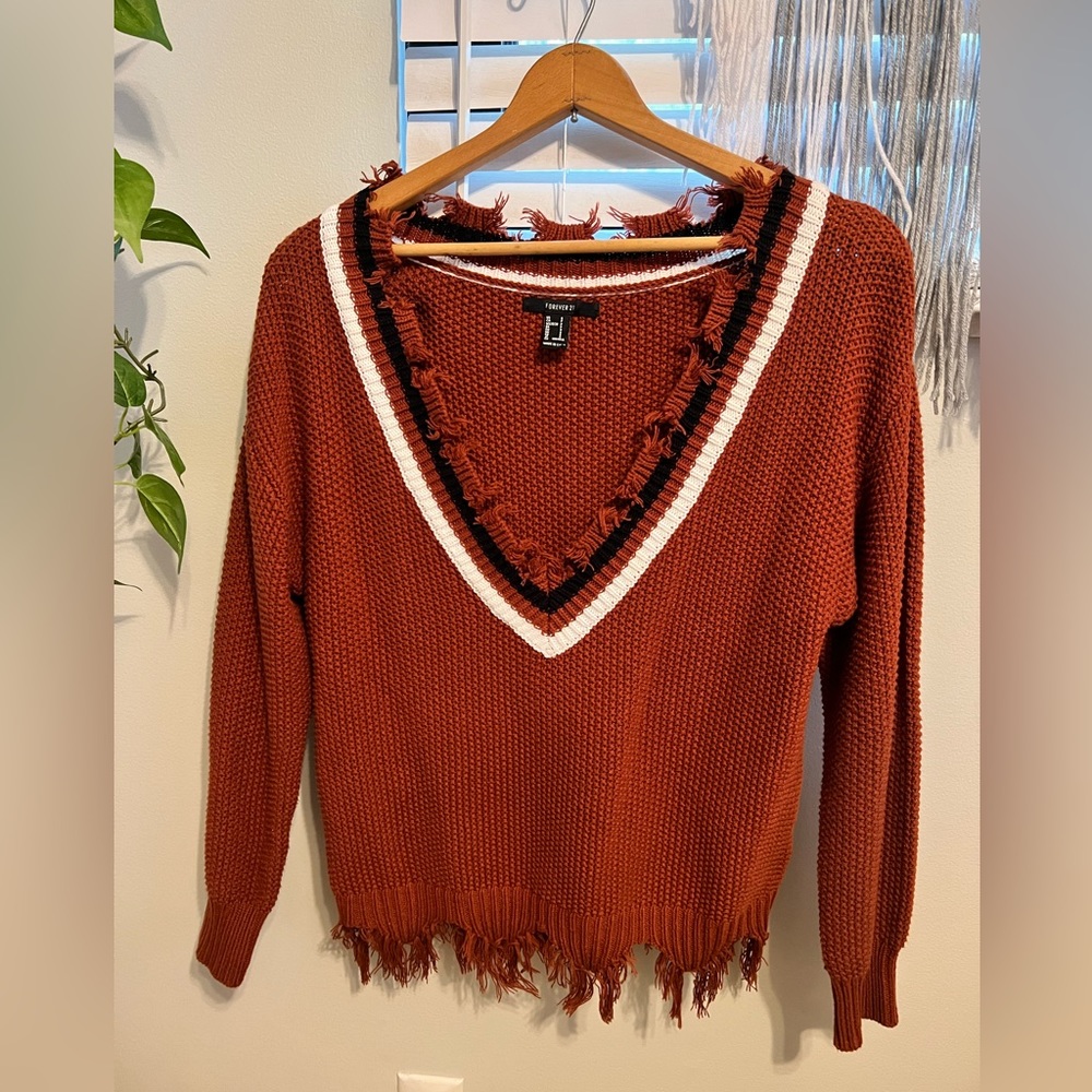 Woman’s size US:S. Forever 21 sweater.